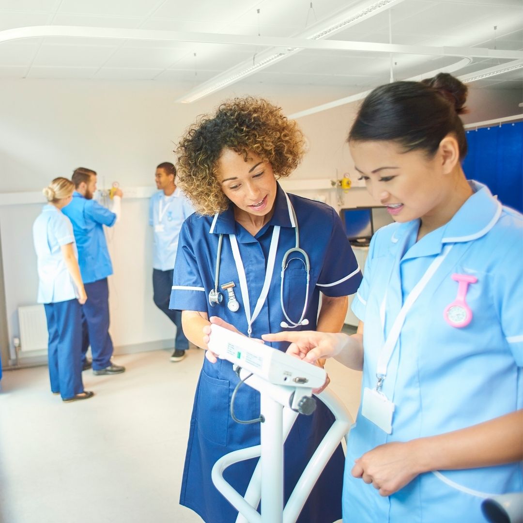 Nursing tutor explaining evidence based practice and professional nursing standards