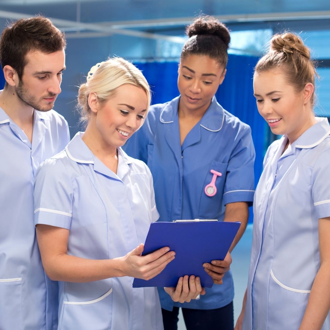 Nursing tutor providing reflective writing guidance